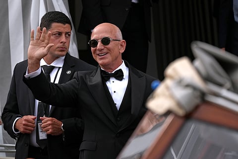 Jeff Bezos leaves a hotel ahead of the anticipated wedding celebrations with Lauren Sanchez, in Venice, Italy, Friday, June 27, 2025.