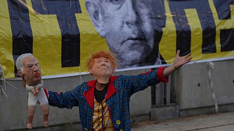 People take part in a protest demanding the end of the war and immediate release of hostages held by Hamas in the Gaza Strip, and against Israeli Prime Minister Benjamin Netanyahu's government in Tel Aviv, Saturday, June 28, 2025. 