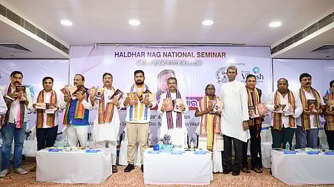 Union MInister Dharmendra Pradhan and Higher Education and Culture minister Suraj Suryabanshi along with Haldhar Nag at the seminar