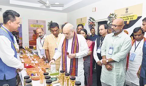 Union Home Minister Amit Shah inspects turmeric products after inaugurating the NTB on Sunday