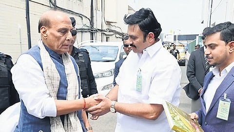 Defence Minister Rajnath Singh being received at the Coimbatore airport on Sunday.