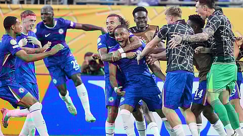 Chelsea's Christopher Nkunku is congratulated after scoring his teams second goal during the Club World Cup round of 16 soccer match between Benfica and Chelsea in Charlotte, N.C., Saturday, June 28, 2025.