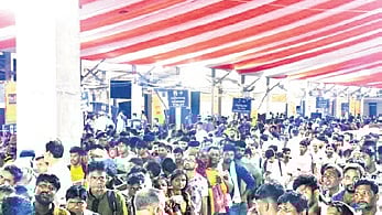 GRP, RPF officers managing passengers’ crowd at Puri railway station on Friday.