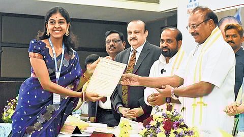 Health Minister Y Satya Kumar Yadav and Tripura Governor Indrasena Reddy Nallu presenting letters of admission to the students in Vijayawada.