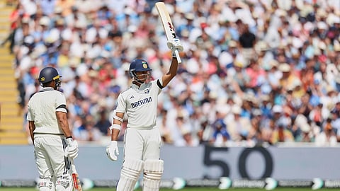 India's Yashasvi Jaiswal, right, celebrates after scoring fifty runs on day one of the second cricket test match between England and India.