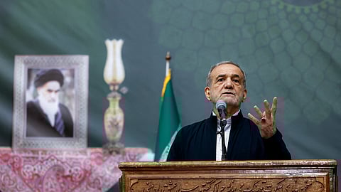 Iran's President Masoud Pezeshkian giving an address on the anniversary of the death of the country's former supreme leader Ayatollah Ruhollah Khomeini at the latter's mausoleum in Tehran on June 3, 2025.