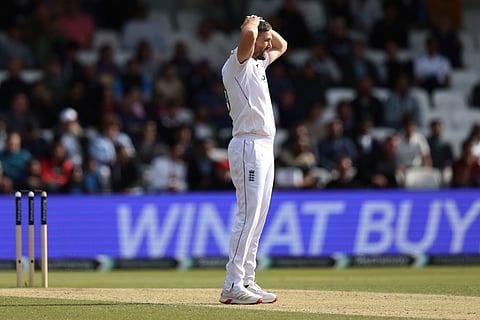 England's Chris Woakes reacts after bowling a delivery on day four of the first cricket test match between England and India at Headingley in Leeds, England, Monday, June 23, 2025.