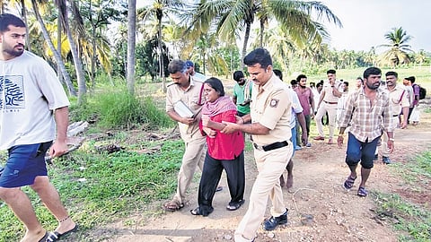 The law student Pavithra who jumped into Cauvery river being rescued by the officials 