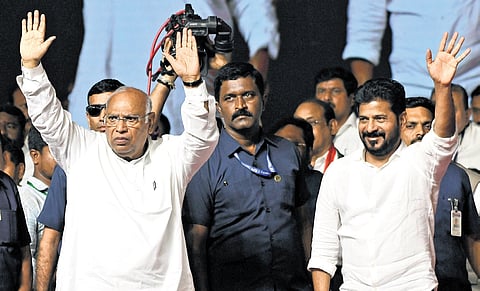 AICC president Mallikarjun Kharge and Chief MInister A Revanth Reddy greet the attendees at the LB stadium in Hyderabad on Friday | Vinay Madapu