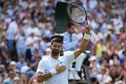 Novak Djokovic of Serbia reacts after beating Daniel Evans of Britain during their second round men's singles match at the Wimbledon Tennis Championships in London, Thursday, July 3, 2025.