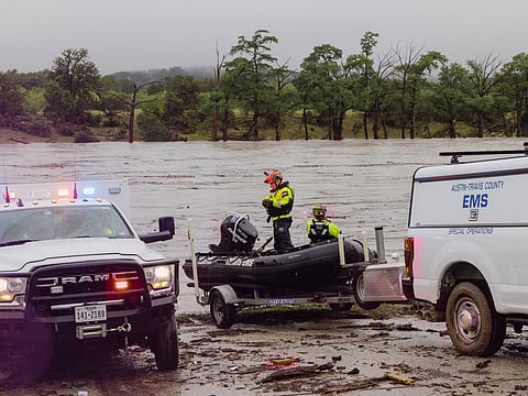 Members of Task Force 1 deploy boats along the Guadalupe River in the wake of a destructive flooding event in Kerrville on Friday July 4, 2025. 