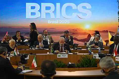 Protesters dressed as police escorting U.S. President Donald Trump and former president of Brazil Jair Bolsonaro demonstrate against Trump's announcement of 50% tariffs on Brazilian goods and against U.S. report that cited counterfeit product sales in Brazil, in Sao Paulo, Friday, July 18, 2025. 