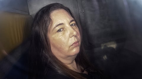 This picture taken on May 12, 2025 shows Erin Patterson arriving in the back of a prison transport vehicle at Latrobe Valley Magistrate's Court in Morwell, Australia