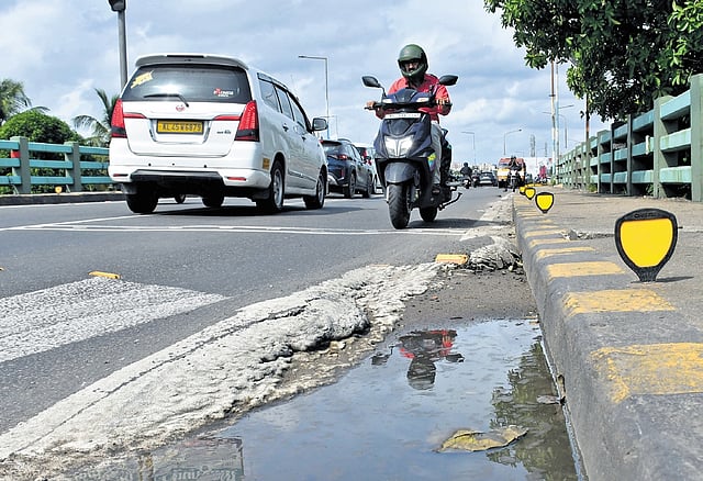 The asphalt has come off and spread to sides, resulting in undulations along the Kundannoor-Thevera bridgePICS: A Sanesh 