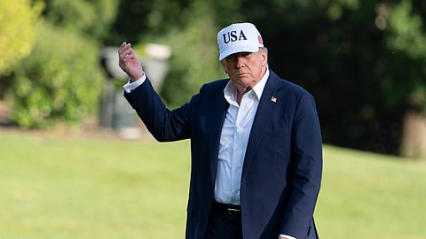 US President Donald Trump gestures as he walks on the South Lawn upon arrival at the White House, Sunday, July 6, 2025, in Washington.