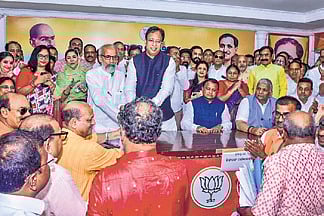 BJP leader Manmohan Samal
filing nomination papers at party
headquarters on Monday.