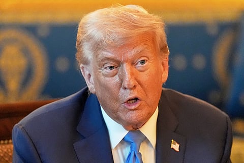US President Donald Trump, center, speaks during a cabinet meeting at the White House, Tuesday, July 8, 2025, in Washington.