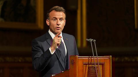 French President Emmanuel Macron addresses parliament in the Palace of Westminster, London, Tuesday, July 8, 2025.