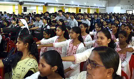 Students and attendees take a pledge against drug abuse as part of Udayam, a Kochi City Police initiative for a drug-free Kochi.