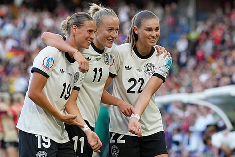 Players of Germany run to celebrate after winning the Women's Euro 2025 quarterfinals soccer match between France and Germany at St. Jakob-Park in Basel, Switzerland, Saturday, July 19, 2025.