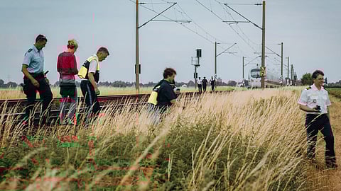 Police and forensic experts investigate a high-speed ICE train on July 3, 2025 near the village of Strasskirchen, Bavaria, after a man had attacked several passengers with "dangerous objects". 
