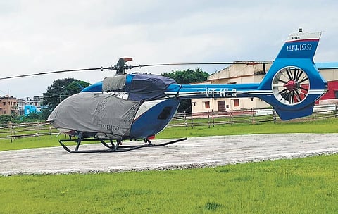 The helicopter stranded on the playground of Kendrapara college
