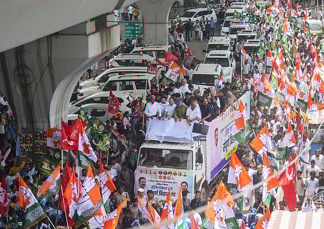 LoP in the Lok Sabha and Congress leader Rahul Gandhi with Bihar party President Rajesh Ram, RJD leader Tejashwi Yadav, CPI General Secretary D Raja, and others takes part in a protest rally during 'Bihar bandh' called by the INDIA bloc