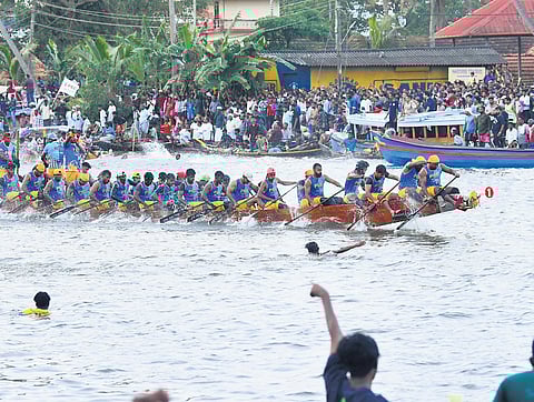 Cheruthana Puthen Chundan, rowed by Cheruthana New Boat Club, finishing first in the Moolam Boat Race held in the Pampa river at Champakulam in Kuttanad on Wednesday