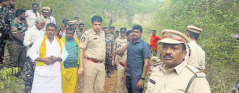 Forest staff and police stop devotees at Annamayya footpath.