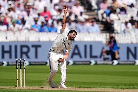 Umpire checks the ball during day three of the third Test at Lord's