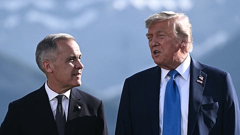 Canada Prime Minister Mark Carney (L) and US President Donald Trump on the sidelines of the 2025 G7 summit in Kananaskis, Canada.