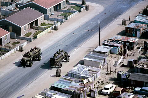 Picture taken on May 28, 1985 at Lingilishwe, the Black township of Cradock in the Eastern Cape, showing military patrols in the streets. 