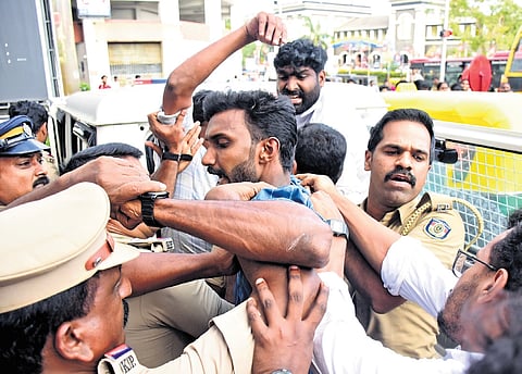Police arrest and remove KSU activists protesting in front of the office of the Commissioner for Entrance Examination in Thiruvananthapuram on Friday 
