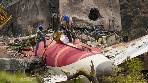 wreckage of the crashed Air India plane, which crashed into a medical college hostel in Ahmedabad