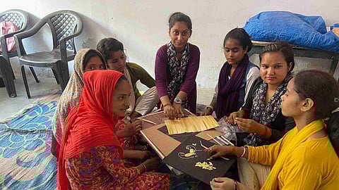 Rachna is now an entrepreneur as well as a third-year Bachelor of Arts student. Her shop selling wheat stalk handmade paintings is a major attraction here. 