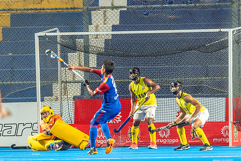 Shanmugam P from Railways scoring the goal against Maharashtra on Monday