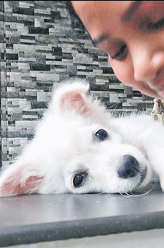 Nayana with her pet dog Pooppi