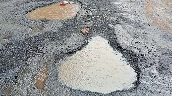 Portion of a damaged road in Sambalpur