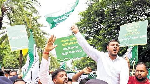 BJD activists stage a protest outside Chief Minister Mohan Charan Majhi’s residence in Bhubaneswar, on Sunday