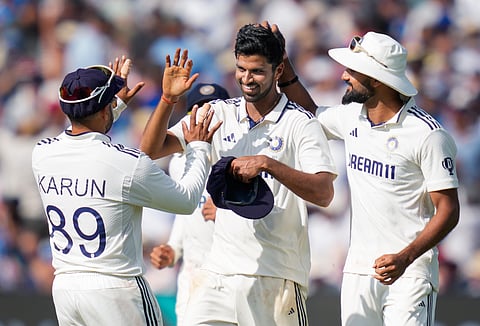 India Off-spinner Washington Sundar celebrates with his teammates on Day 4 of the Test on Sunday