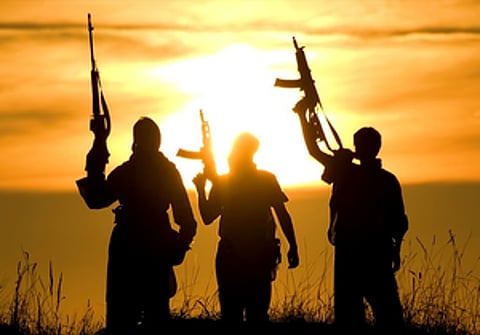 Members of Syria's security forces patrol an area between Mazraa and Walga near the predominantly Druze city of Sweida on July 14, 2025, following clashes between Bedouin tribes and Druze fighters. 