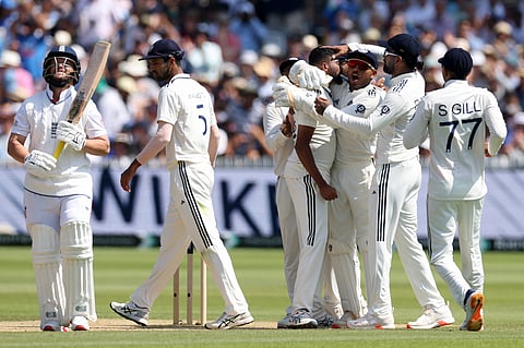 England's captain Ben Stokes celebrates the dismissal of India's Jasprit Bumrah on Monday