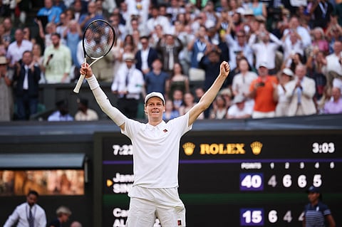 Italy's Jannik Sinner celebrates after beating Spain's Carlos Alcaraz at the end of their men's singles final tennis match of the 2025 Wimbledon Championships on July 13, 2025.