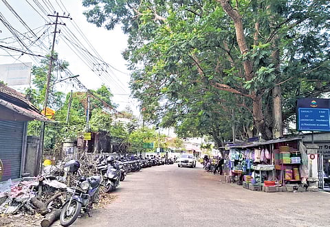 A view of the vehicles parked at Sri Ramakrishna Mission Hospital Road | Express 
