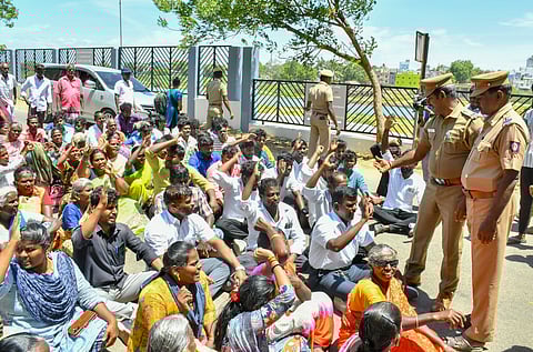 Scheduled Caste residents of the Munneerpallam region, staged a protest in front of the Tirunelveli collectorate on Tuesday, alleging that the police had registered a case against SC youths.