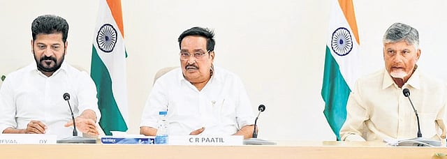 Union Jal Shakti Minister CR Patil, flanked by Telangana Chief Minister A Revanth Reddy and his Andhra Pradesh counterpart 
N Chandrababu Naidu, speaks during a meeting in Delhi on Wednesday