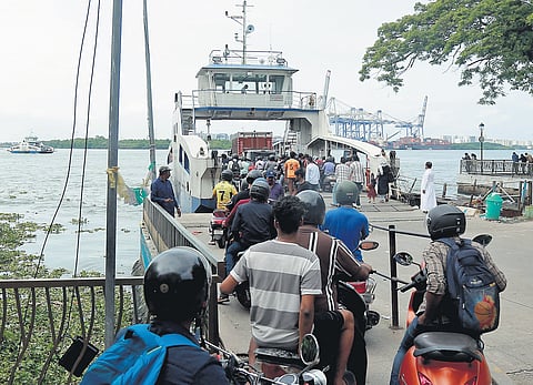 Commuters and motorists board the Ro-Ro vessel at Fort Kochi
