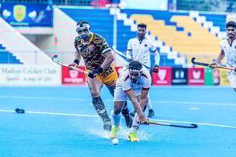 Indian Navy's Selvaraj K scores a penalty corner against Indian Oil on Thursday