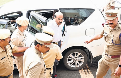 Kerala University Vice-Chancellor in-charge Dr Mohanan Kunnummal arriving at the university under heavy police protection. The V-C came to the office after a gap of about 20 days 