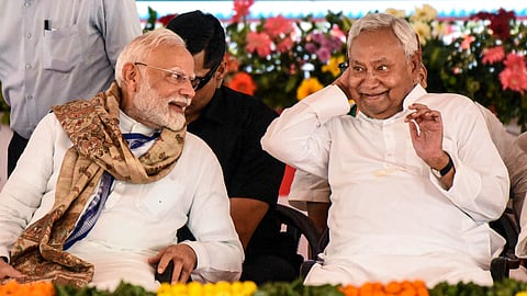 Prime Minister Narendra Modi with Bihar Chief Minister Nitish Kumar during the inauguration and foundation stone laying ceremony of various developmental projects, in Motihari, Bihar, Friday, July 18, 2025. 